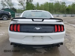 2021 Ford Mustang EcoBoost z VIN 1FA6P8TH7M5141555, wystawiony jako Copart lot #54016865 z przebiegiem 21 548 mil mil oraz Szkoda całkowita • Salvage title. Historia ofert i sprzedaży dostępna na DreamBid. Obrazek 6.