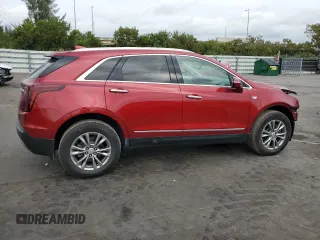 2021 Cadillac XT5 FWD Premium Luxury with VIN 1GYKNCRS7MZ149310, listed as a Copart auction lot 87937445 with 13,829 mi miles and Salvage Title. Bid and sale history available at DreamBid. Image 3.