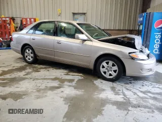 2000 Toyota Avalon XL with VIN 4T1BF28B1YU033159, listed as a Copart auction lot 52796755 with 247,062 mi miles and Salvage Title. Bid and sale history available at DreamBid. Image 4.