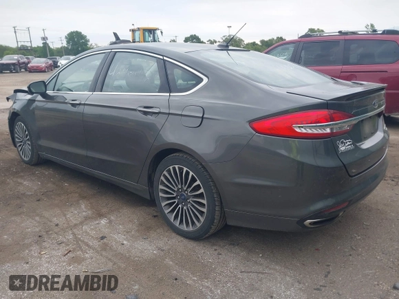 2017 Ford Fusion Titanium with VIN 3FA6P0K96HR208757, listed as a IAAI auction lot 42400172 with 90,000 mi miles and . Bid and sale history available at DreamBid. Image 3.
