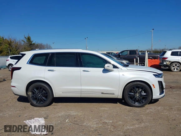 2022 Cadillac XT6 Premium Luxury with VIN 1GYKPCRS2NZ177625, listed as a IAAI auction lot 41646155 with 94,694 mi miles and . Bid and sale history available at DreamBid. Image 13.
