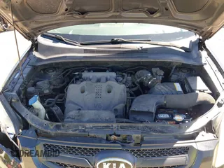 2010 Kia Sportage LX with VIN KNDKGCA34A7669279, listed as a IAAI auction lot 42132770 with 142,828 mi miles and . Bid and sale history available at carsss.com. Image 10.