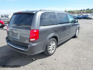 2019 Dodge Grand Caravan SXT with VIN 2C4RDGCG5KR758602, listed as a IAAI auction lot 42033617 with 186,351 mi miles. Bid and sale history available at carsss.com. Image 4.