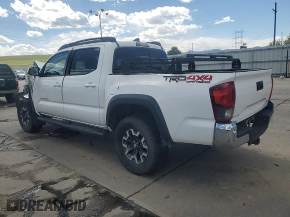 2018 Toyota Tacoma SR with VIN 5TFCZ5AN3JX128204, listed as a Copart auction lot 53970865 with 76,986 mi miles and Salvage Title. Bid and sale history available at DreamBid. Image 2.