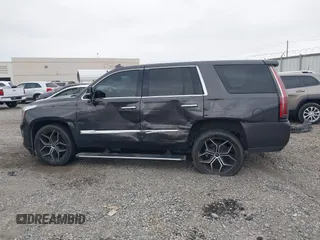 2016 Cadillac Escalade Platinum z VIN 1GYS4DKJ1GR363238, wystawiony jako IAAI lot #40974636 z przebiegiem 128 296 mil mil oraz . Historia ofert i sprzedaży dostępna na DreamBid. Obrazek 14.