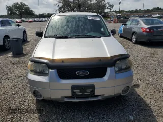 2006 Ford Escape Hybrid z VIN 1FMCU96H36KA35403, wystawiony jako Copart lot #65374705 z przebiegiem 127 689 mil mil oraz Czysty tytuł • Clean title. Historia ofert i sprzedaży dostępna na DreamBid. Obrazek 5.