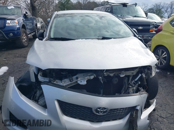 2009 Toyota Corolla with VIN JTDBL40E899083155, listed as a IAAI auction lot 41056942 with 294,132 mi miles. Bid and sale history available at carsss.com. Image 12.