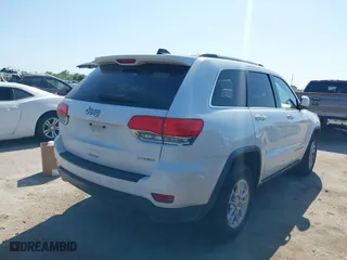 2014 Jeep Grand Cherokee Laredo with VIN 1C4RJEAG2EC107005, listed as a IAAI auction lot 41970670 with 299,211 mi miles. Bid and sale history available at carsss.com. Image 4.