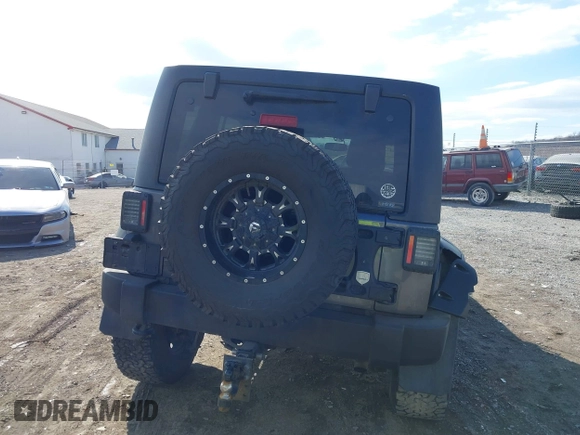 2014 Jeep Wrangler Unlimited Sport with VIN 1C4HJWDG1EL251271, listed as a IAAI auction lot 41647210 with 100,168 mi miles. Bid and sale history available at carsss.com. Image 17.