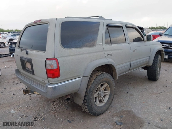 1998 Toyota 4Runner Limited with VIN JT3HN87R7W0184602, listed as a IAAI auction lot 41942100 with 272,823 mi miles. Bid and sale history available at carsss.com. Image 4.