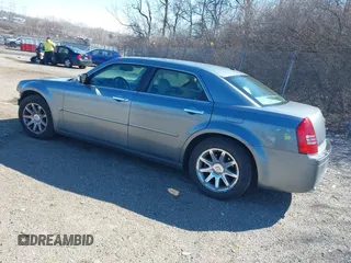 2006 Chrysler 300 C with VIN 2C3KA63HX6H518989, listed as a IAAI auction lot 41741341 with 134,636 mi miles. Bid and sale history available at carsss.com. Image 3.