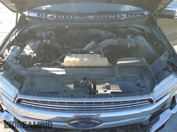 2019 Ford F-150 XL with VIN 1FTEW1E5XKKC33146, listed as a Copart auction lot 58918355 with 113,016 mi miles and Salvage title. Bid and sale history available at DreamBid. Image 11.