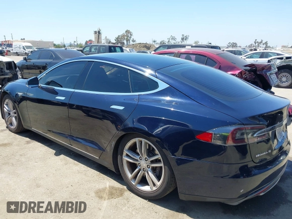 2013 Tesla Model S with VIN 5YJSA1DN1DFP05317, listed as a IAAI auction lot 42086998 with 150,964 mi miles. Bid and sale history available at carsss.com. Image 3.