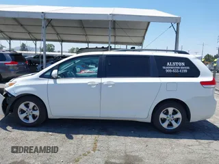2011 Toyota Sienna LE AAS with VIN 5TDKK3DC3BS164612, listed as a IAAI auction lot 42302123 with 165,941 mi miles and . Bid and sale history available at DreamBid. Image 14.