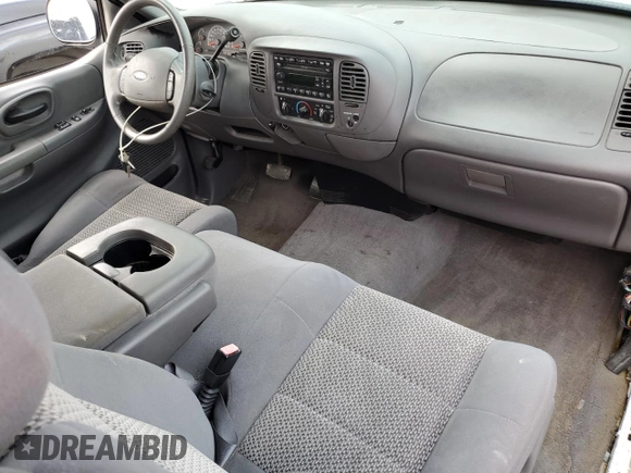 2003 Ford F-150 XL with VIN 1FTRX17L53NB90331, listed as a Copart auction lot 76686124 with 0 mi miles and Salvage Title. Bid and sale history available at carsss.com. Image 8.