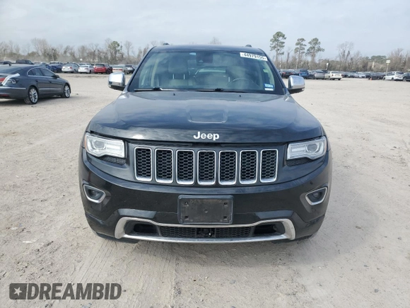 2015 Jeep Grand Cherokee Overland with VIN 1C4RJFCT6FC628729, listed as a Copart auction lot 44979155 with 105,959 mi miles and Salvage Title. Bid and sale history available at DreamBid. Image 5.