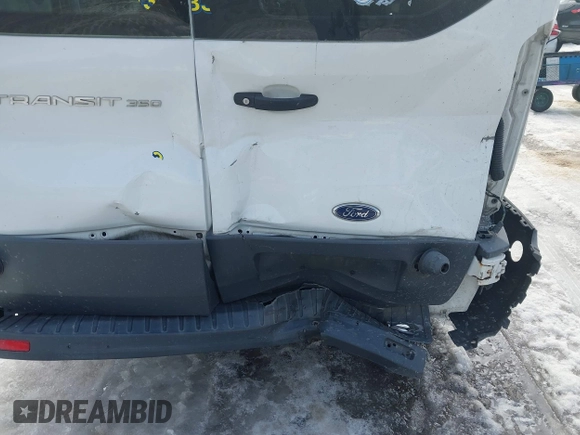 2018 Ford Transit Passenger XL z VIN 1FBZX2CMXJKA07321, wystawiony jako IAAI lot #41373858 z przebiegiem 197 135 mil mil oraz . Historia ofert i sprzedaży dostępna na DreamBid. Obrazek 18.