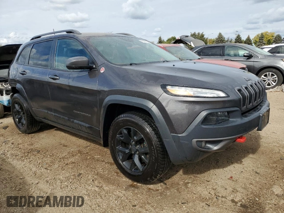 2018 Jeep Cherokee Trailhawk with VIN 1C4PJMBB2JD506327, listed as a Copart auction lot 75747364 with 186,413 mi miles and Salvage Title. Bid and sale history available at DreamBid. Image 4.