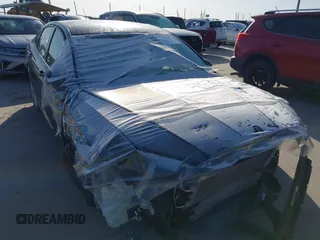 2015 Ford Fusion S Hybrid with VIN 3FA6P0UU9FR106402, listed as a IAAI auction lot 41983961 with 27,122 mi miles. Bid and sale history available at carsss.com. Image 1.