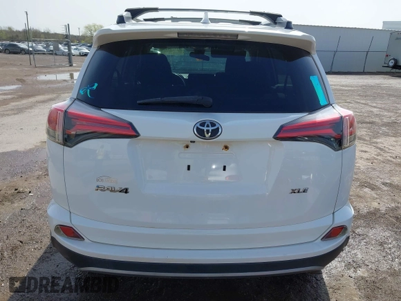 2017 Toyota RAV4 XLE with VIN 2T3WFREV3HW324973, listed as a IAAI auction lot 41778641 with 113,617 mi miles and . Bid and sale history available at DreamBid. Image 16.