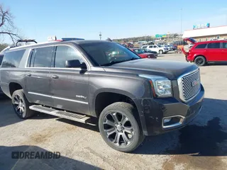 2015 GMC Yukon XL Denali with VIN 1GKS2JKJ9FR634771, listed as a IAAI auction lot 41676218 with 73,271 mi miles. Bid and sale history available at carsss.com. Image 13.
