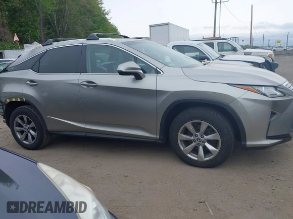 2018 Lexus RX 350 z VIN 2T2BZMCA4JC157690, wystawiony jako IAAI lot #42155397 z przebiegiem 104 075 mil mil oraz . Historia ofert i sprzedaży dostępna na DreamBid. Obrazek 14.