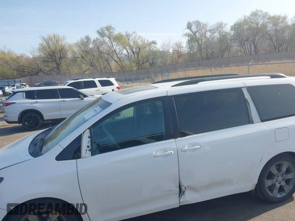 2012 Toyota Sienna SE with VIN 5TDXK3DC1CS221798, listed as a IAAI auction lot 41989210 with 198,962 mi miles. Bid and sale history available at carsss.com. Image 15.