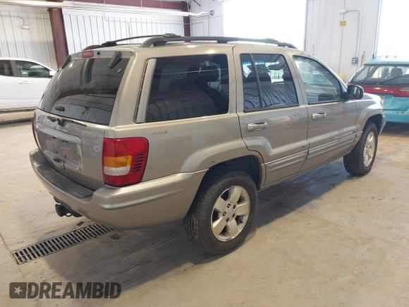 2001 Jeep Grand Cherokee Limited with VIN 1J4GW58S01C566671, listed as a IAAI auction lot 42193545 with 204,887 mi miles and . Bid and sale history available at DreamBid. Image 4.