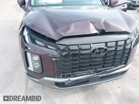 2023 Hyundai Palisade Limited z VIN KM8R54GE0PU517573, wystawiony jako IAAI lot #41870400 z przebiegiem 11 477 mil mil oraz . Historia ofert i sprzedaży dostępna na DreamBid. Obrazek 6.