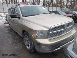 2011 Ram 1500 SLT with VIN 1D7RV1GT5BS516785, listed as a IAAI auction lot 41369434 with 150,283 mi miles. Bid and sale history available at carsss.com. Image 1.