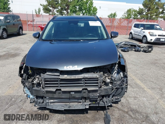 2023 Kia Sportage EX with VIN KNDPVCAG4P7014112, listed as a IAAI auction lot 42610022 with 50,680 mi miles and . Bid and sale history available at DreamBid. Image 13.