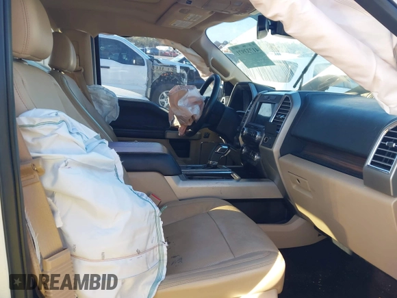2016 Ford F-150 XLT with VIN 1FTFW1EF4GFA70555, listed as a IAAI auction lot 41733971 with 218,209 mi miles. Bid and sale history available at carsss.com. Image 5.