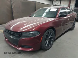 2020 Dodge Charger SXT with VIN 2C3CDXBG4LH101261, listed as a IAAI auction lot 42045103 with 114,349 mi miles. Bid and sale history available at carsss.com. Image 2.