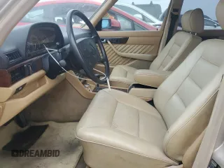 1989 Mercedes-Benz 560 with VIN WDBCA39E1KA479955, listed as a Copart auction lot 76202804 with 132,546 mi miles and Salvage Title. Bid and sale history available at DreamBid. Image 7.
