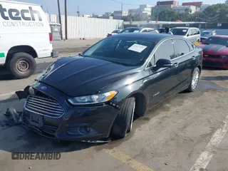 2013 Ford Fusion SE Hybrid with VIN 3FA6P0LU4DR325699, listed as a IAAI auction lot 41677237 with 129,004 mi miles. Bid and sale history available at carsss.com. Image 17.