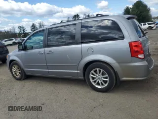 2014 Dodge Grand Caravan SXT with VIN 2C4RDGCG7ER141867, listed as a Copart auction lot 53187715 with 231,414 mi miles and Clean Title. Bid and sale history available at DreamBid. Image 2.