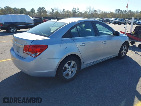 2014 Chevrolet Cruze 1LT with VIN 1G1PC5SB8E7201279, listed as a IAAI auction lot 41851574 with 125,806 mi miles and . Bid and sale history available at DreamBid. Image 4.