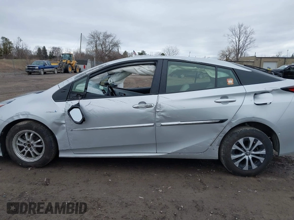2021 Toyota Prius LE z VIN JTDL9MFU4M3028389, wystawiony jako IAAI lot #41800573 z przebiegiem 32 623 mil mil oraz . Historia ofert i sprzedaży dostępna na DreamBid. Obrazek 14.