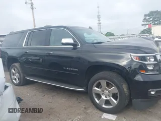 2018 Chevrolet Suburban Premier with VIN 1GNSCJKC9JR100504, listed as a IAAI auction lot 42276280 with 153,916 mi miles and . Bid and sale history available at DreamBid. Image 13.