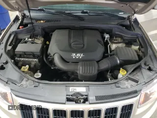 2014 Jeep Grand Cherokee Limited z VIN 1C4RJFBG1EC148908, wystawiony jako Copart lot #54311675 z przebiegiem 90 886 mil mil oraz Szkoda całkowita • Salvage title. Historia ofert i sprzedaży dostępna na DreamBid. Obrazek 12.