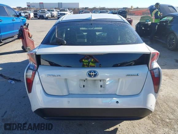 2017 Toyota Prius Two z VIN JTDKARFU9H3043444, wystawiony jako IAAI lot #41729481 z przebiegiem 148 706 mil mil oraz . Historia ofert i sprzedaży dostępna na DreamBid. Obrazek 16.