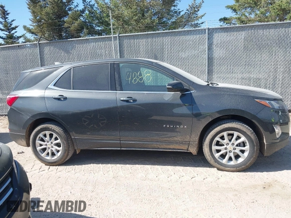 2018 Chevrolet Equinox LT z VIN 2GNAXSEV5J6207807, wystawiony jako IAAI lot #42224888 z przebiegiem 77 435 mil mil oraz . Historia ofert i sprzedaży dostępna na DreamBid. Obrazek 13.