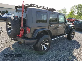 2008 Jeep Wrangler Unlimited X z VIN 1J4GA39128L518897, wystawiony jako Copart lot #52297525 z przebiegiem 163 676 mil mil oraz Nie do naprawy • Non repairable. Historia ofert i sprzedaży dostępna na DreamBid. Obrazek 3.