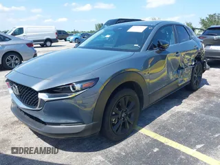 2024 Mazda CX-30 S Carbon Edition z VIN 3MVDMBCM0RM661018, wystawiony jako IAAI lot #42326256 z przebiegiem 22 169 mil mil oraz . Historia ofert i sprzedaży dostępna na DreamBid. Obrazek 17.
