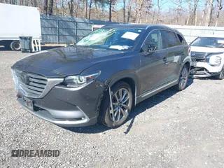 2019 Mazda CX-9 Grand Touring with VIN JM3TCBDY3K0307964, listed as a IAAI auction lot 41706594 with 170,596 mi miles and . Bid and sale history available at DreamBid. Image 18.