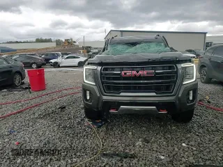 2021 GMC Yukon AT4 with VIN 1GKS2CKD8MR299277, listed as a Copart auction lot 47027565 with 54,806 mi miles and Salvage Title. Bid and sale history available at carsss.com. Image 14.