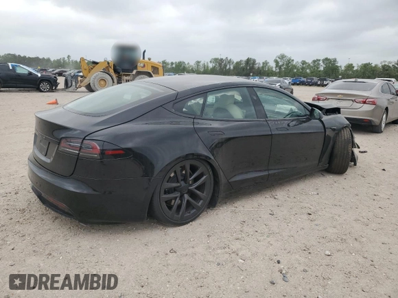 2023 Tesla Model S z VIN 5YJSA1E58PF531166, wystawiony jako Copart lot #51827565 z przebiegiem Nie podano mil oraz Szkoda całkowita • Salvage title. Historia ofert i sprzedaży dostępna na DreamBid. Obrazek 3.