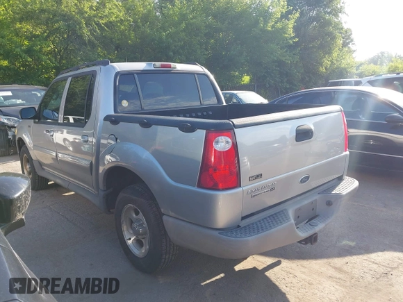 2003 Ford Explorer Sport Trac XLS z VIN 1FMZU67EX3UB19974, wystawiony jako IAAI lot #42563671 z przebiegiem 133 452 mil mil oraz . Historia ofert i sprzedaży dostępna na DreamBid. Obrazek 3.
