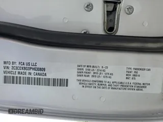 2023 Dodge Charger SXT z VIN 2C3CDXBG0PH630809, wystawiony jako Copart lot #57946105 z przebiegiem 50 749 mil mil oraz Tytuł czysty. Historia ofert i sprzedaży dostępna na DreamBid. Obrazek 12.