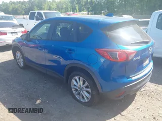 2013 Mazda CX-5 Grand Touring with VIN JM3KE2DEXD0123314, listed as a IAAI auction lot 42064266 with 288,935 mi miles. Bid and sale history available at carsss.com. Image 3.